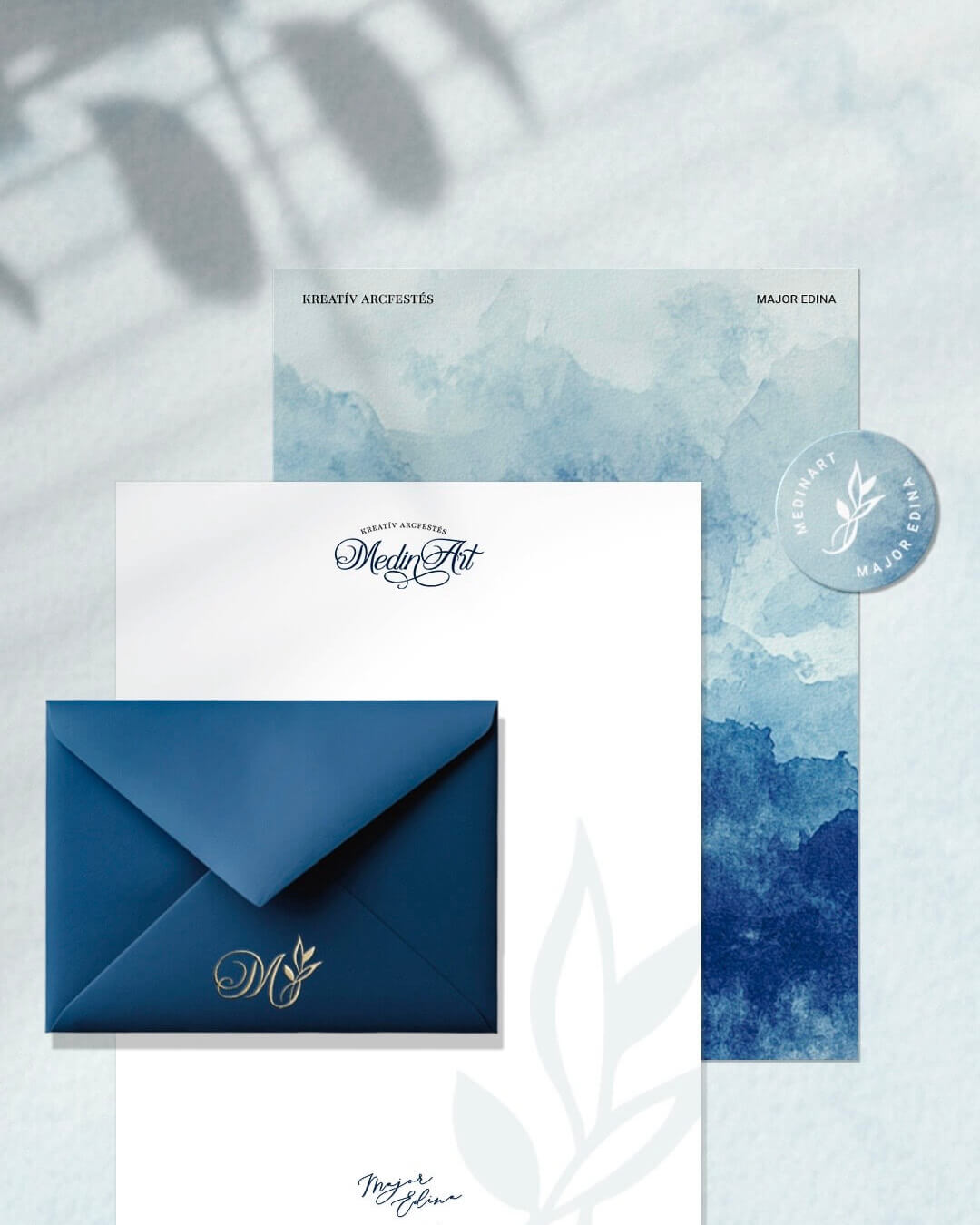 MedinArt komplett arculattervezés logóval, borítékkal és arculati elemekkel